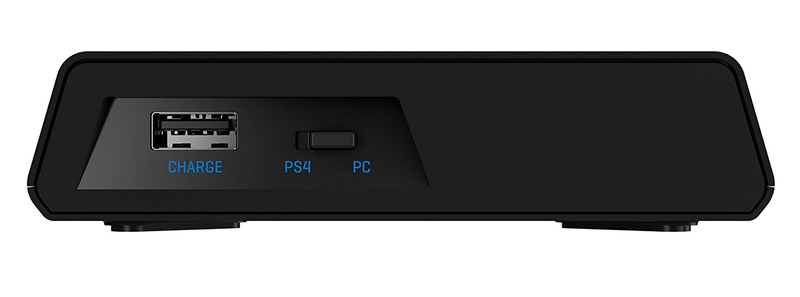 The dock from the side. USB output for charging the headset while wearing it, and a toggle for console and PC.